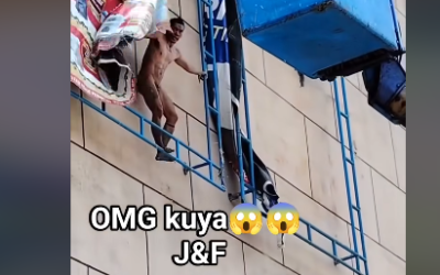 BFP Rescues Naked Man from Billboard Frame in Tacloban
